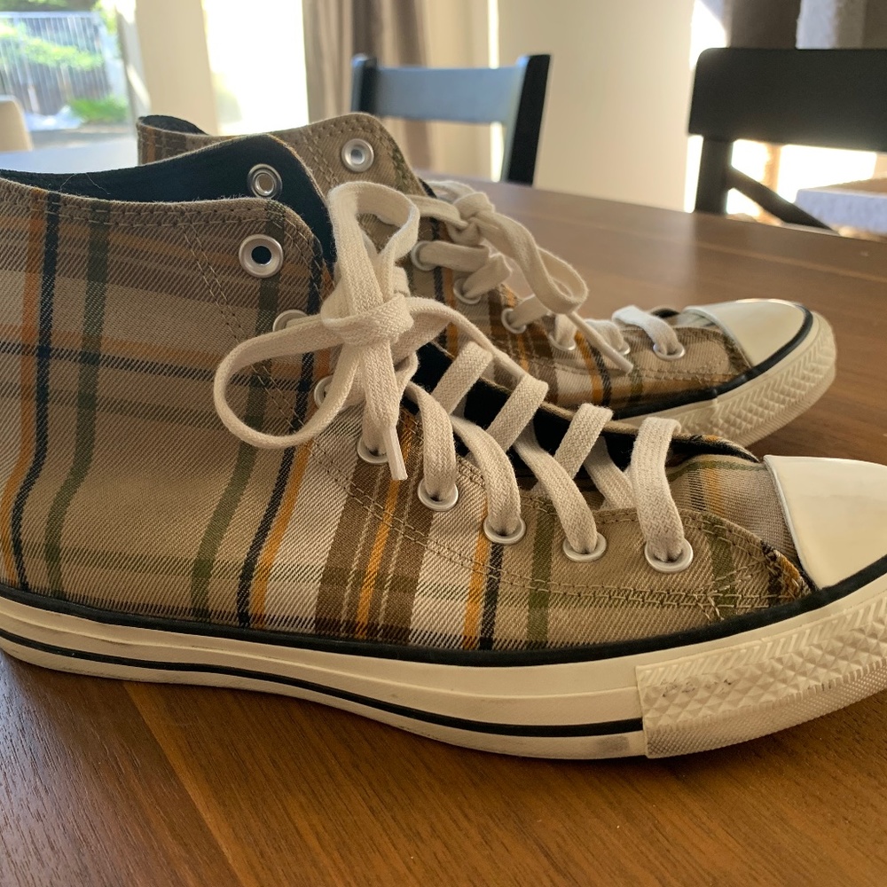 Classic high-top Chuck Taylors in plaid